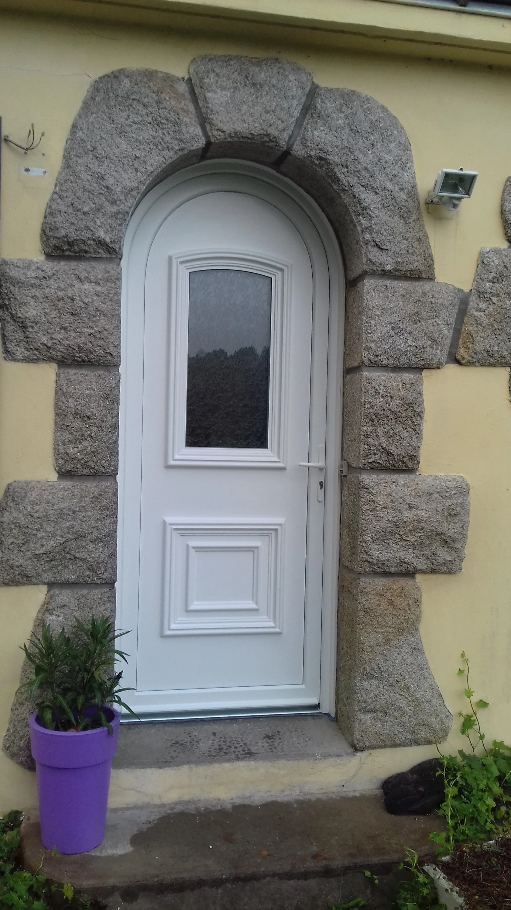 Porte PVC plein cintre