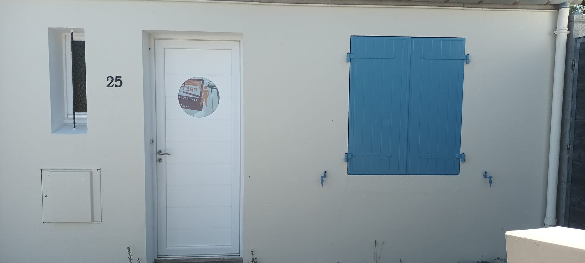 Porte d'entrée PVC avec hublot à Séné